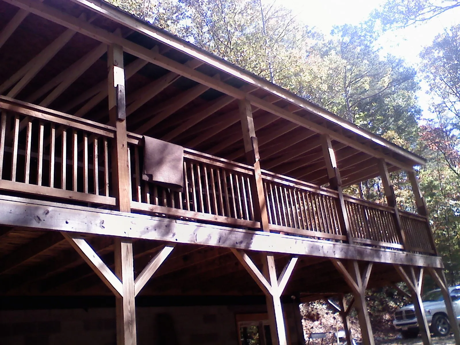 Timber framing under a new elevated porch and deck — Roof Leak Repair in Snook by Roofing Brothers